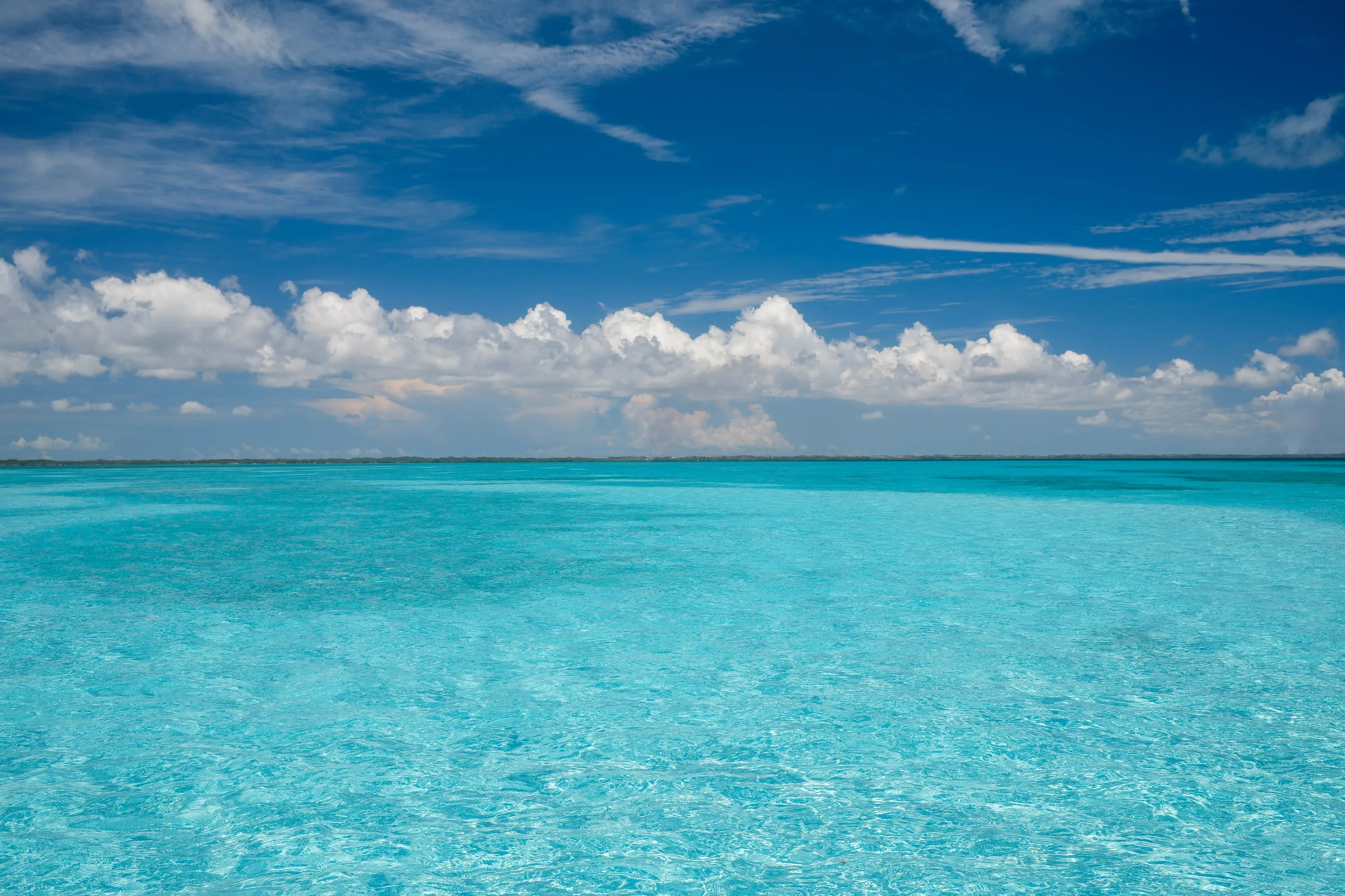 Open water under a broken sky.