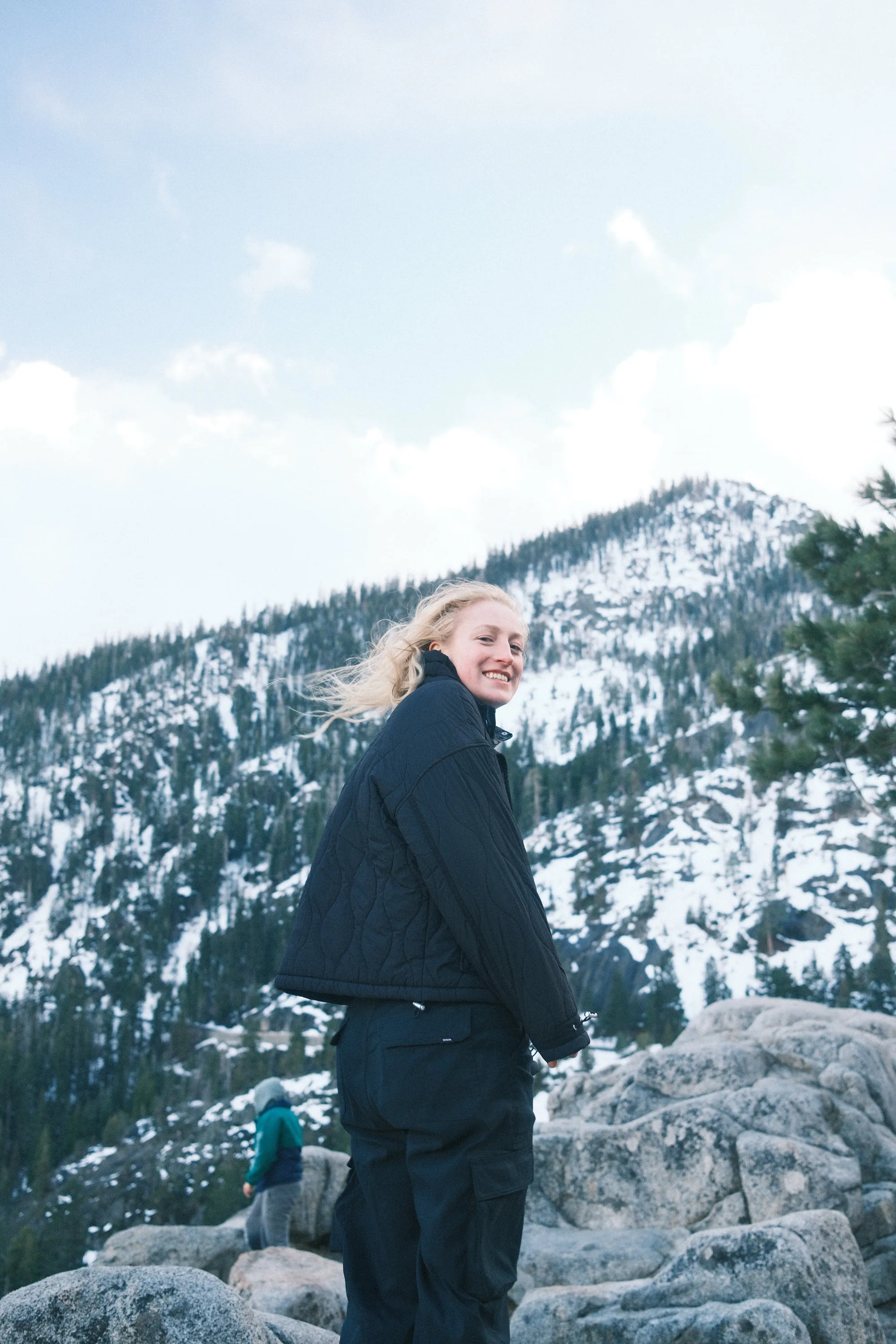 Turning back on the rocks, wind in the hair.